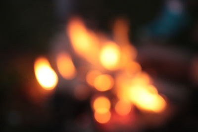 Defocused image of illuminated lights at night