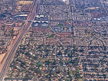 High angle view of street and buildings in city