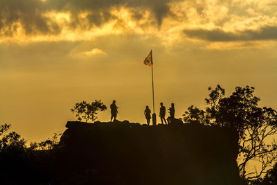 Silhouette of sunset  at  pha chu thong phu hin rong kla national park, phitsanulok , thailand