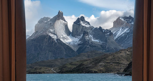 Scenic view of snowcapped mountains against sky