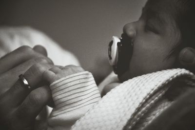 Close-up of baby with father