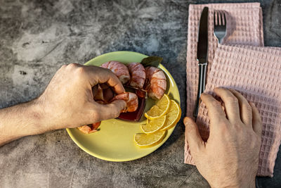 Midsection of man preparing food