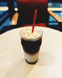 Close-up of coffee cup on table