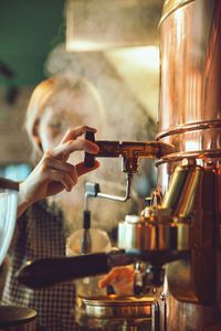 Midsection of woman preparing food