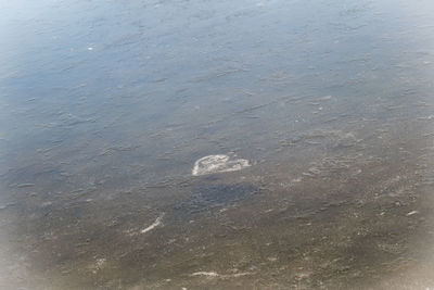 Close-up of rippled water against sky