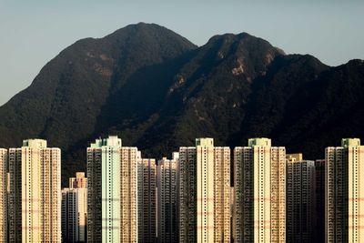 View of buildings in city against sky