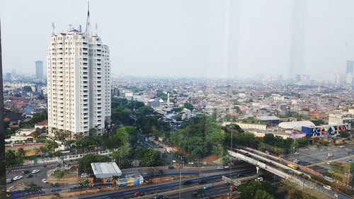 High angle view of street amidst buildings in city