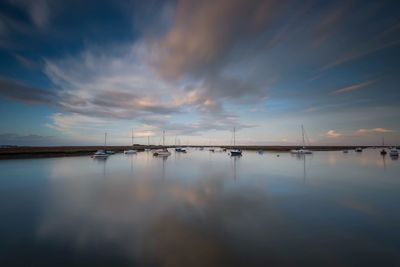 Scenic view of sea against sky at sunset