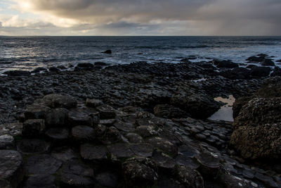 Scenic view of sea against sky at sunset