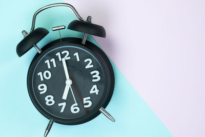 Close-up of clock on wall