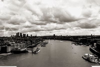 High angle view of river amidst buildings in city