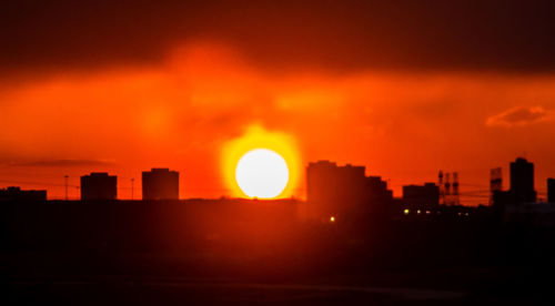 Silhouette of buildings at sunset