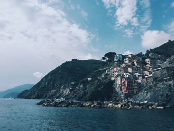 Scenic view of town against sky