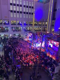 High angle view of people on street at night