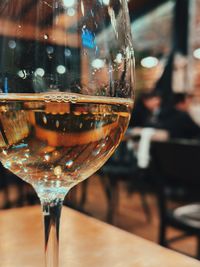 Close-up of wineglass on table