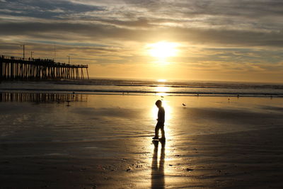 Scenic view of sea at sunset