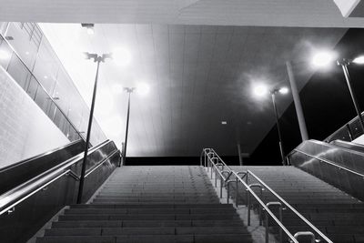 Low angle view of illuminated staircase at night