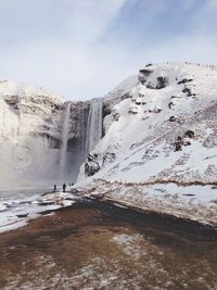 Scenic view of skogafoss waterfall during winter