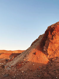 Scenic view of desert against clear sky