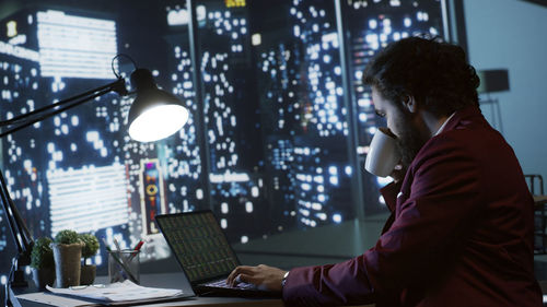 Young woman using laptop at home