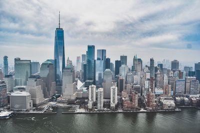 Modern buildings in city against sky