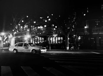 Illuminated street light at night