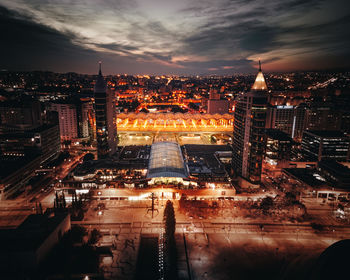 High angle view of illuminated buildings at night