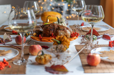 Thanksgiving,christmas or halloween celebration traditional dinner table setting food concept 