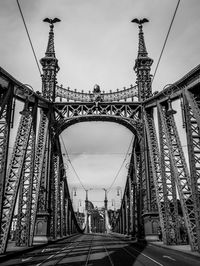 Low angle view of liberty bridge against sky on sunny day