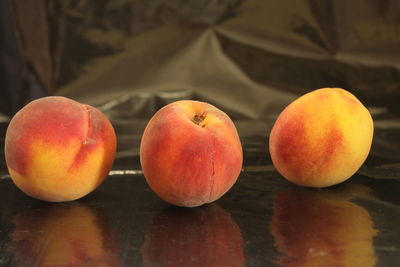 Close-up of apples on table