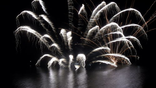 Firework display at night