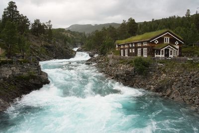 Scenic view of river against sky