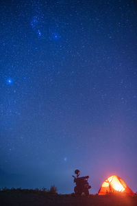 Low angle view of star field against sky at night