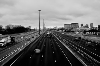 High angle view of highway in city against sky