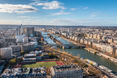 High angle view of river amidst buildings in city