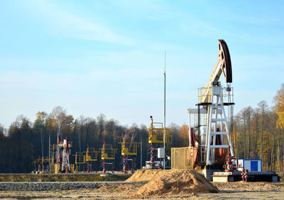 Construction site on field against sky