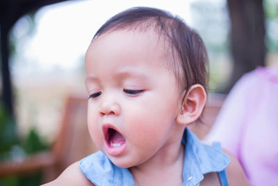 Close-up portrait of cute baby girl