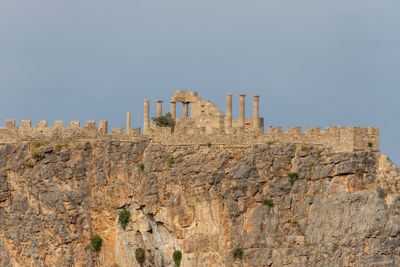 Close-up of the antique acropolis of lindos on greek island rhodes on a sunny day in spring