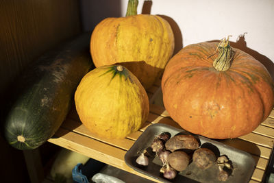 Pumpkin on table. autumn harvest. vegetables from garden. fruits from garden. yellow pumpkin.