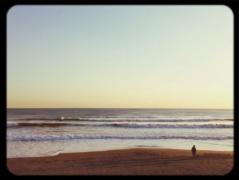 Scenic view of sea at sunset