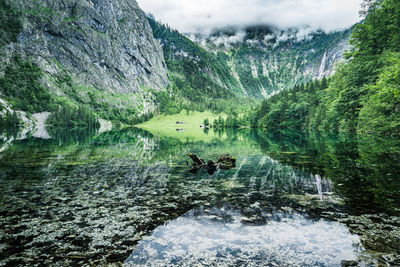 Atmospheric view of obersee lake and mountains, national park berchtesgaden, bavaria, germany