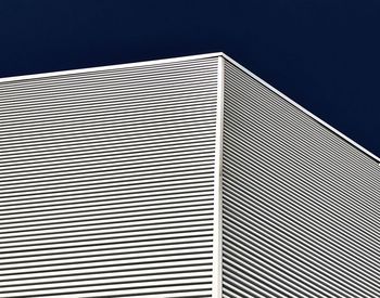 Low angle view of modern building against clear sky