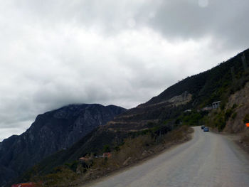 Country road passing through mountains