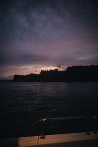 Scenic view of sea against sky at dusk