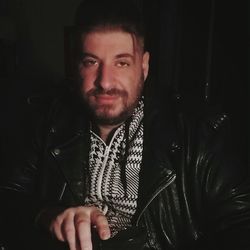 Portrait of man in leather jacket