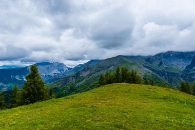 A picturesque landscape view of the french alps mountains on a cloudy summer day