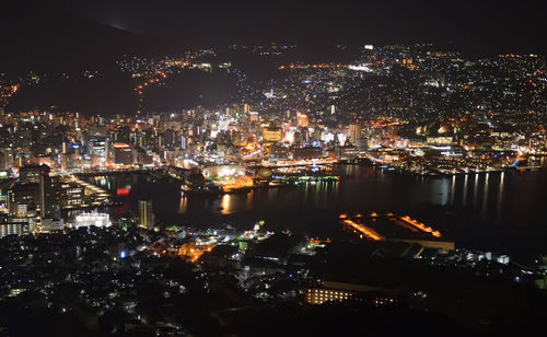 High angle view of illuminated city buildings