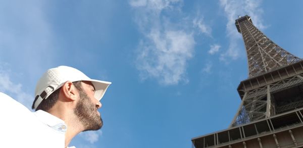Low angle view of man against sky