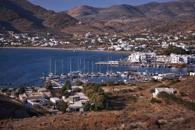 High angle view of townscape by lake