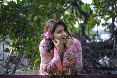 Portrait of a smiling young woman